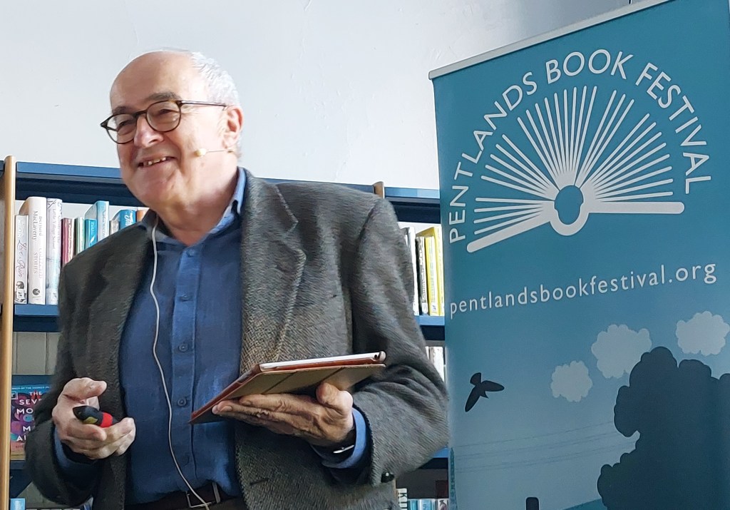 Neil Price with Book